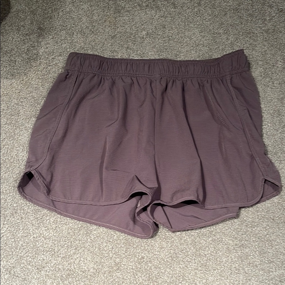 FEAT Athletic Purple Shorts with Elastic Waistband and Curved Hem